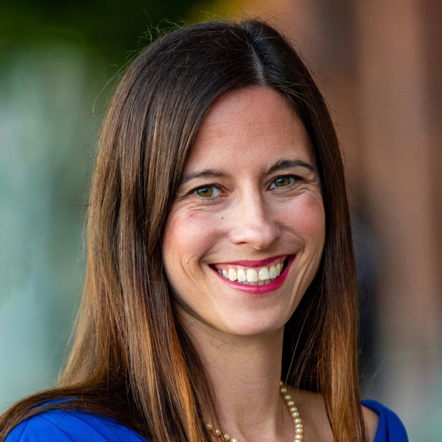 Betsy Cooper's headshot.